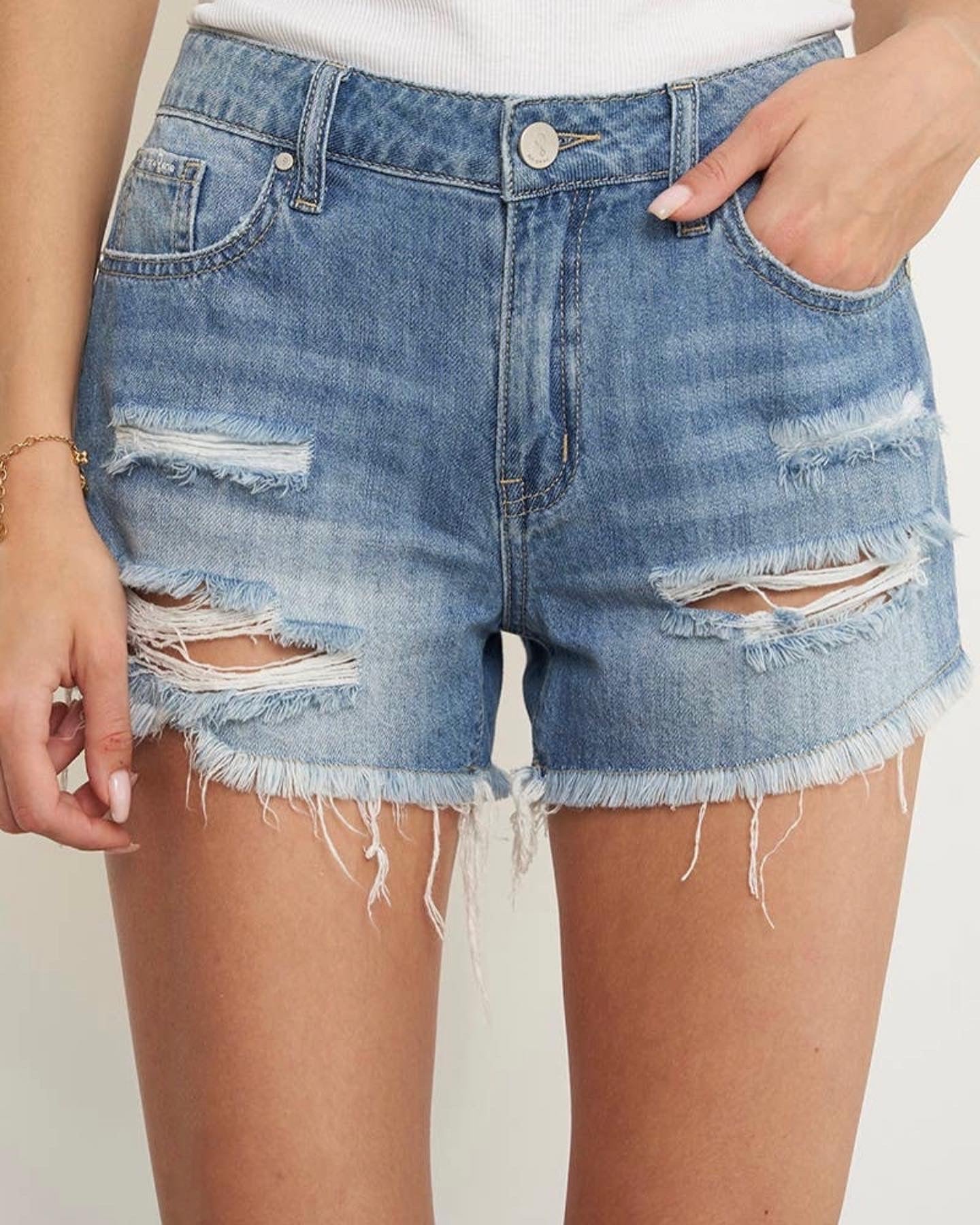 Mid Rise Distressed Denim Shorts